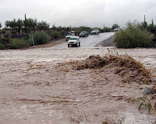 flooding across a road due to the hurricane