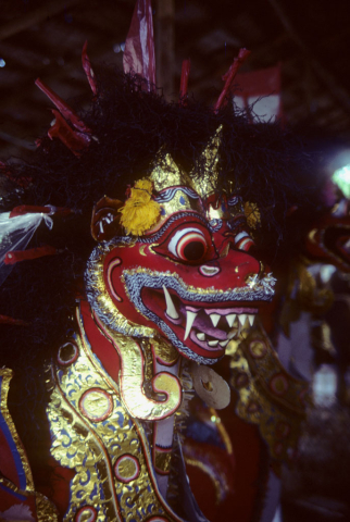 Red and gold lion cremation figure