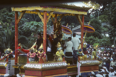 Priests ride ornate float to cremation grounds for high-status funeral on July 23, 1986