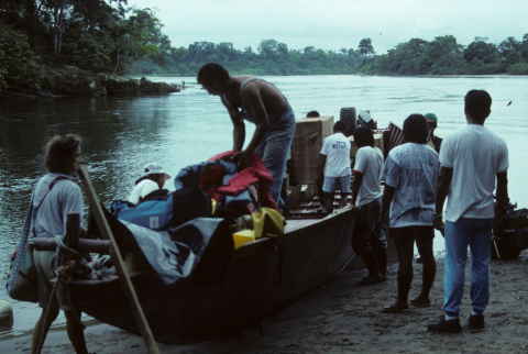 Preparing a boat for launch at Misahualli, Ecuador