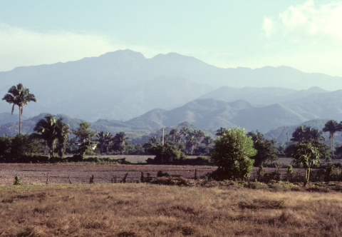 Mountains rise over fields north of Puerto Vallarta, Mexico