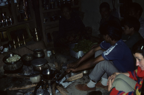 Tourists and guides around the hearth
